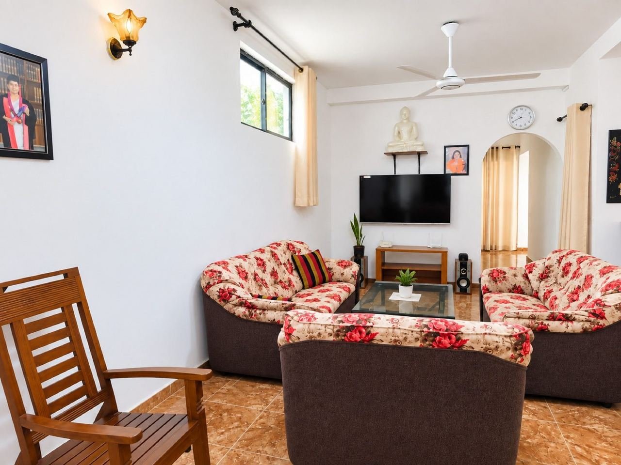 Bright minimalist living room with floral seating – Three storey House for sale in Maharagama Pamunuwa