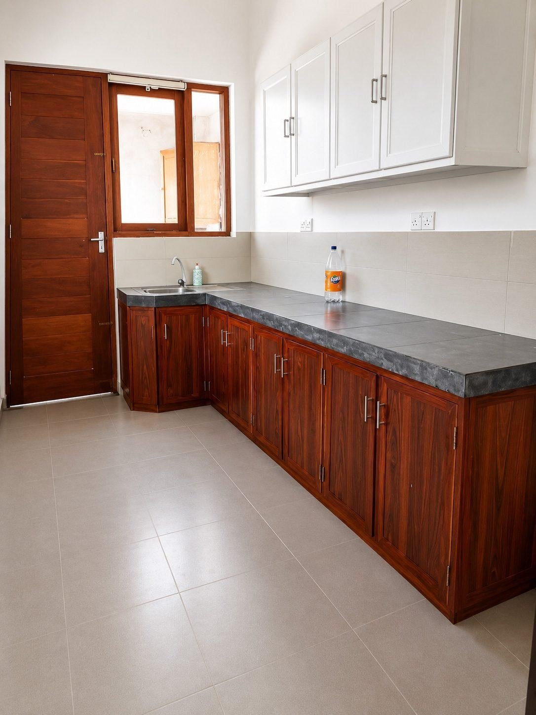 Bright modern kitchen with warm wood cabinets – Three Houses on One Lot for Sale in Rajagiriya