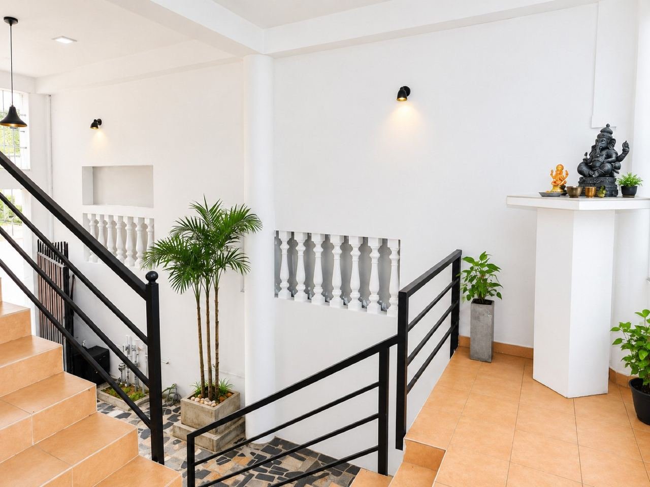 Modern stair landing with shrine and plants – Three storey House for sale in Maharagama Pamunuwa
